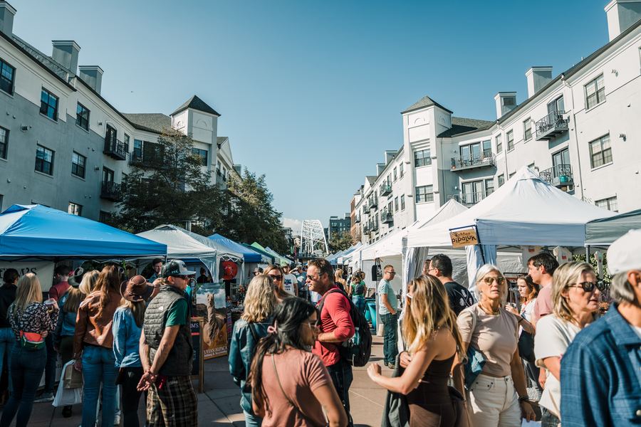 Rows of market tents along Platte Street