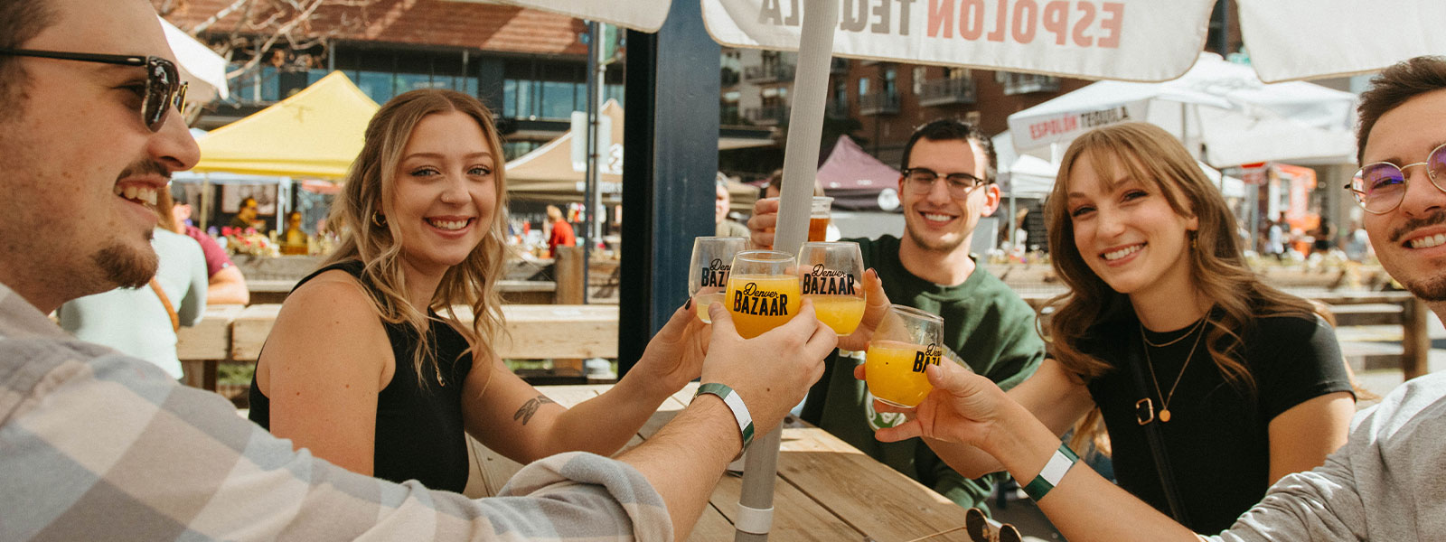 Friends enjoying mimosas at Denver BAZAAR